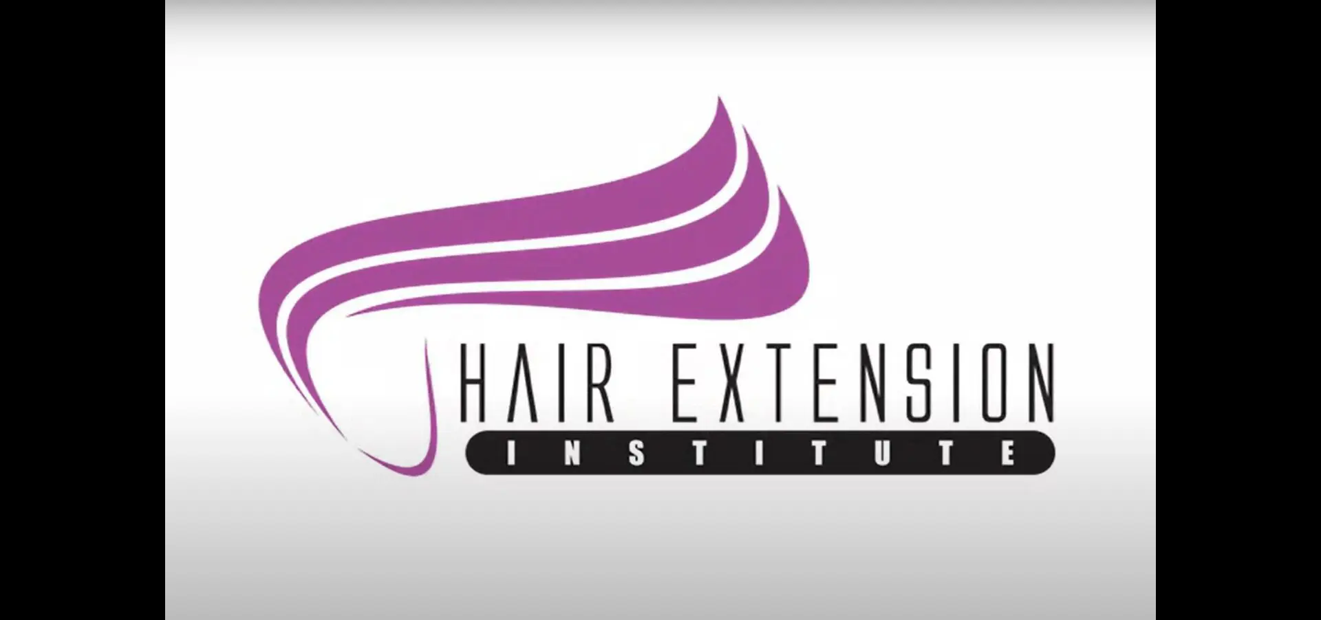 Logo of Hair Extension Institute with a stylized purple hair graphic above the text.